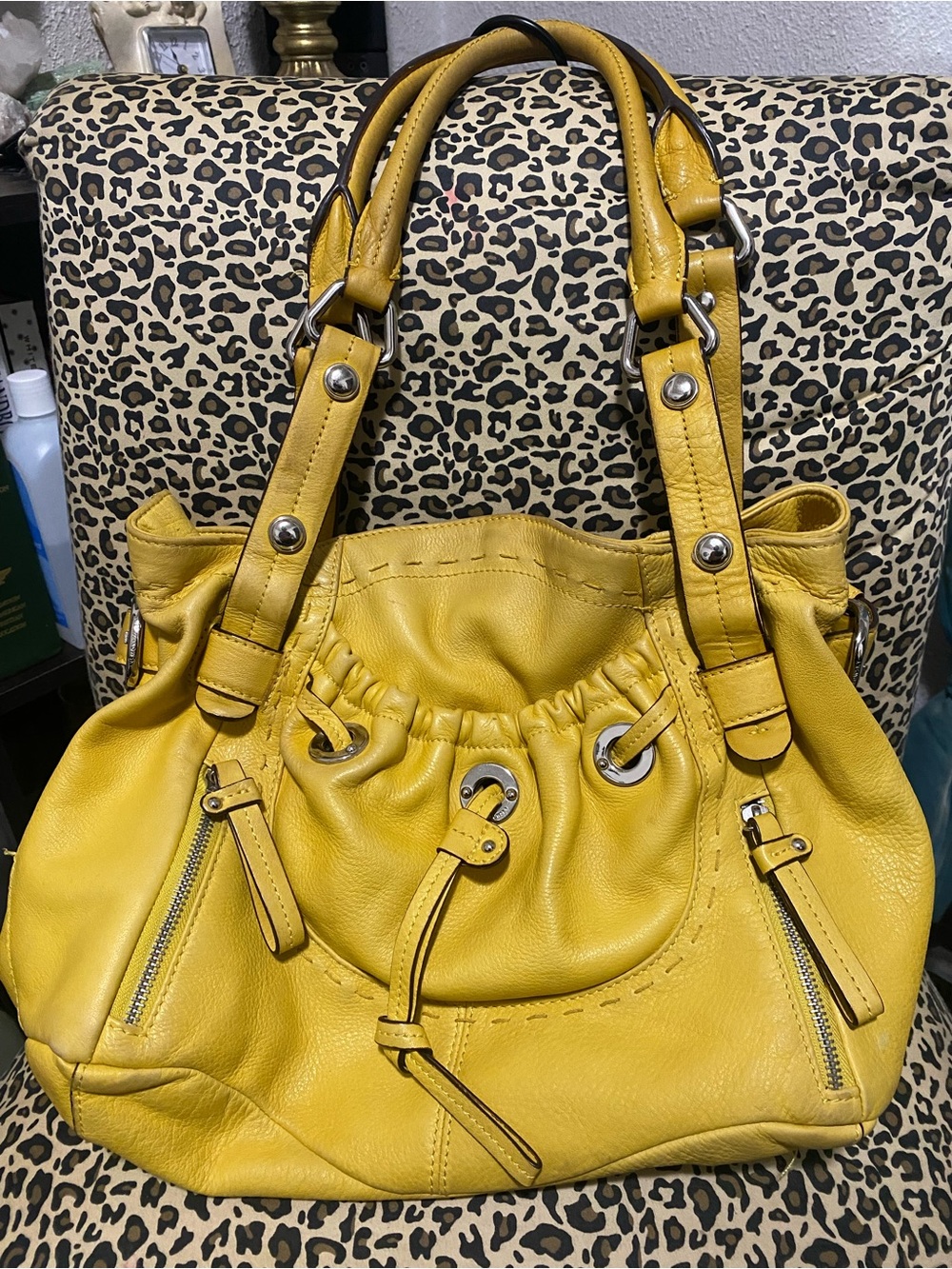 B. Makowsky daffodil yellow pebbled leather shoulder bag/satchel.